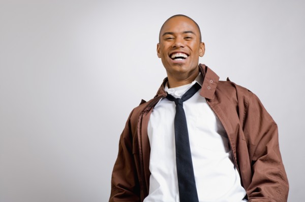 Studio portrait of young man wearing jacket. Photo : Noah Clayton