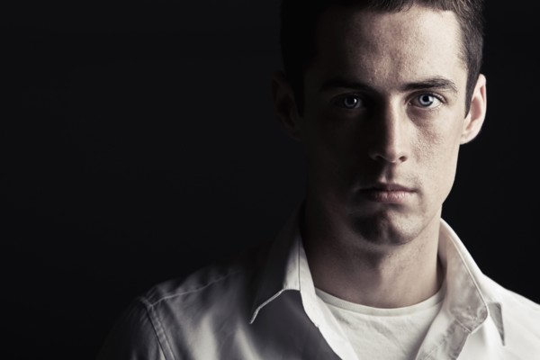 Powerful Low Key Shot of a Serious Looking Teen