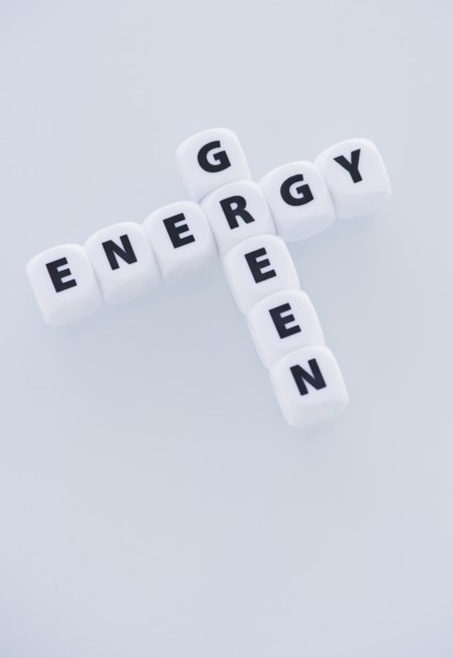 Studio shot of dice spelling out green energy. Photo: Daniel Grill