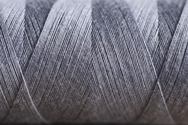 Close-up view of silver string spool. Photo : Kristin Lee