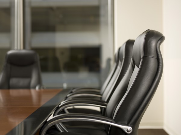 Paper and telephone in board room. Photo: Dan Bannister