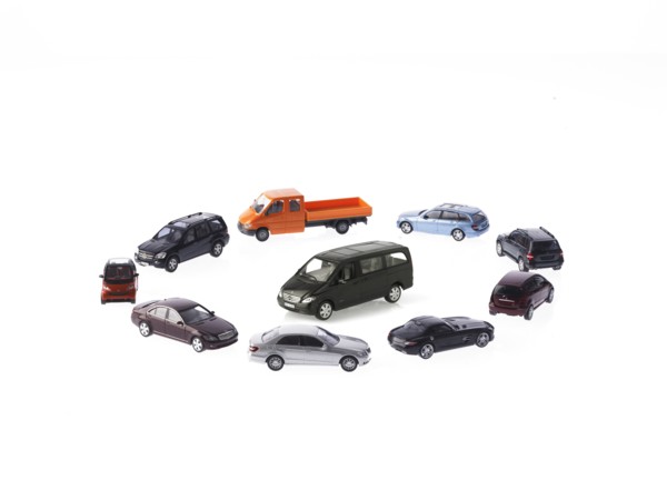 Circle of different cars on white background. Photo : David Arky