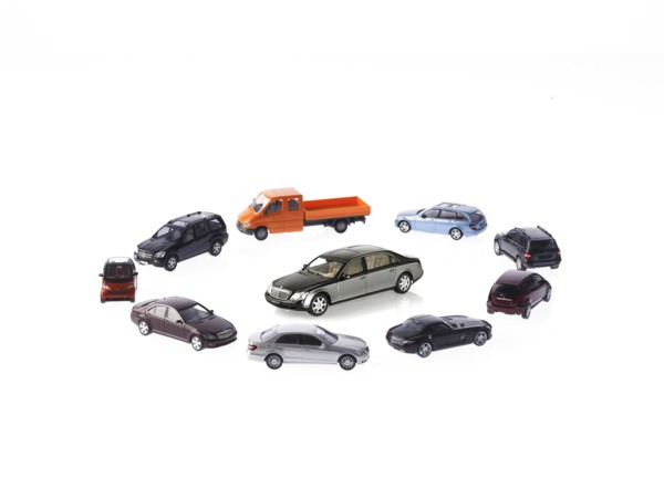 Circle of different cars on white background. Photo : David Arky