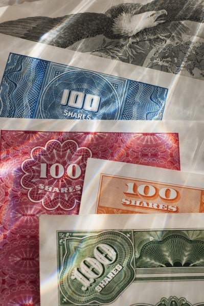 Close up of various stock shares.