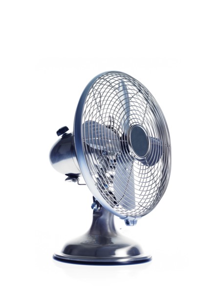 Electric fan on white background. Photo : David Arky