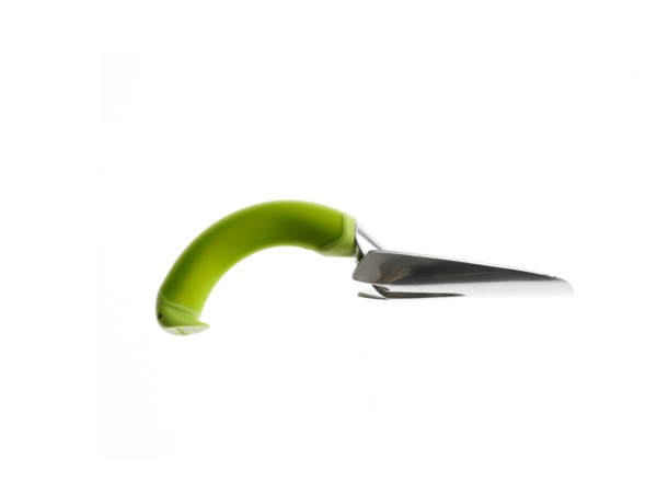 Green trowel on white background. Photo : David Arky