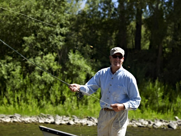 USA, Colorado, Man fly-fishing. Photo : John Kelly
