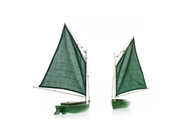 Two toy boats on white background. Photo: David Arky