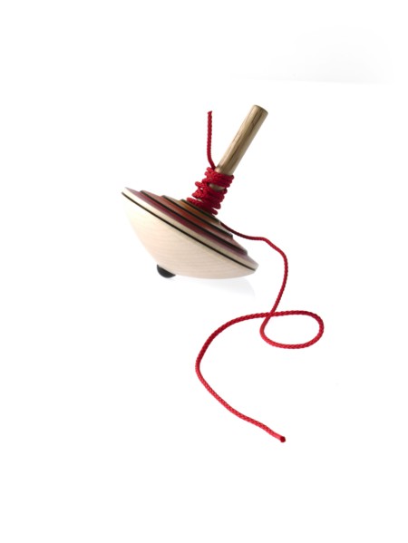 Spinning top on white background. Photo: David Arky