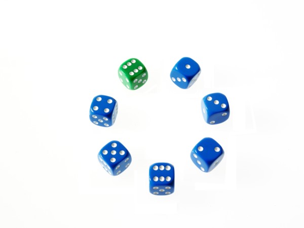 Dice on white background. Photo: David Arky
