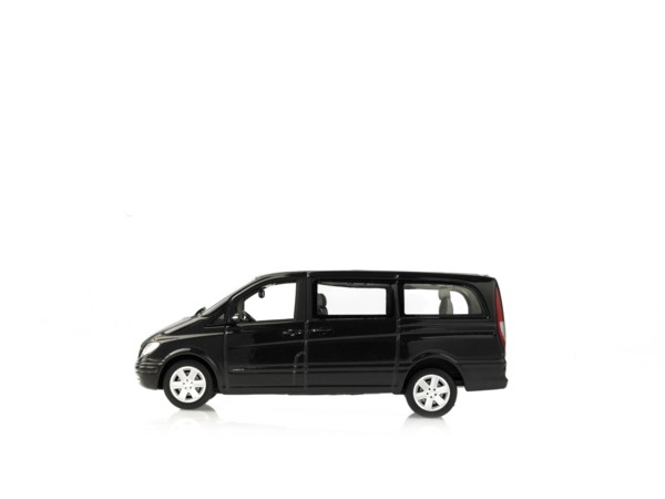 Studio shot of white toy truck. Photo : David Arky