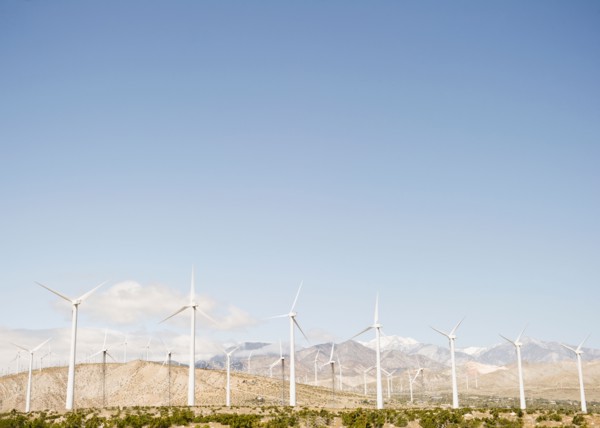 USA, California, Palm Springs, Coachella Valley, San Gorgonio Pass, Wind turbines with mountains in