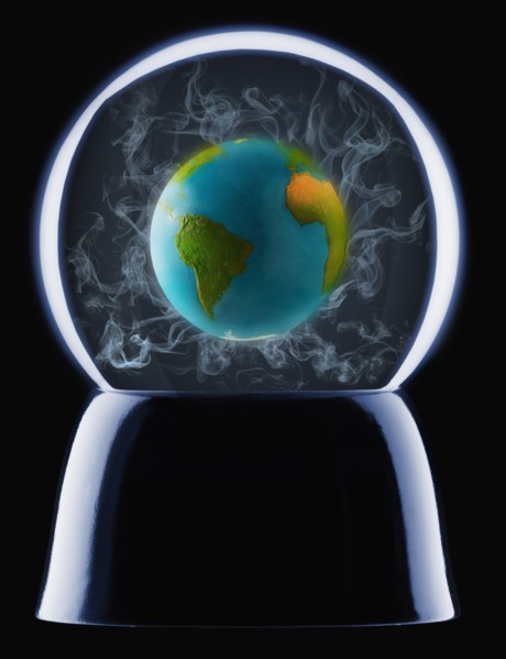 Studio shot of crystal ball showing globe inside. Photo : Mike Kemp