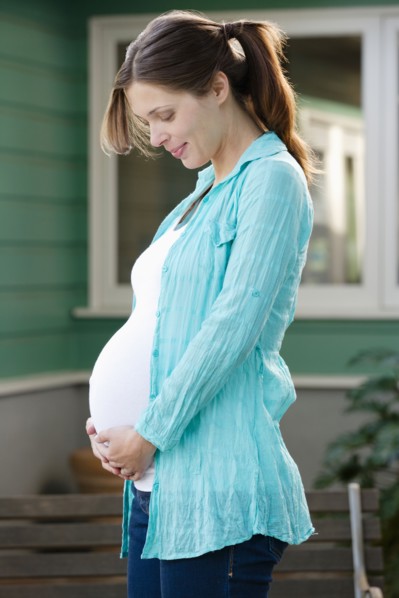 Portrait of expectant mother. Photo : Rob Lewine