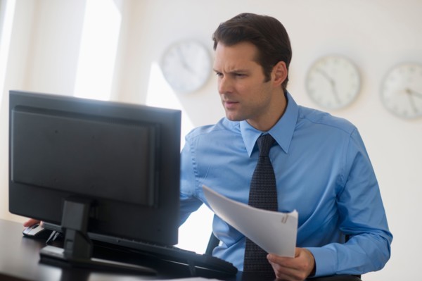 Businessman working on computer.