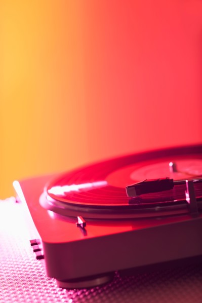 Close up of turntable on colored background. Photo: Daniel Grill