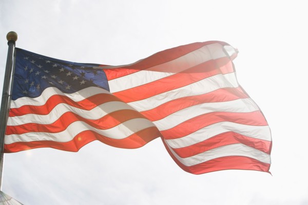 American flag against sky. Photo : fotog