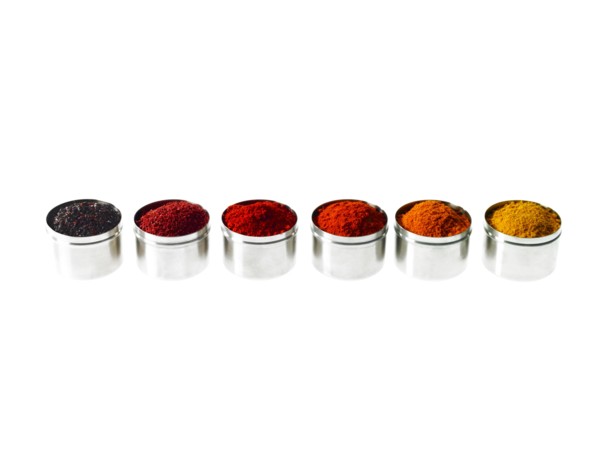 Studio shot of row of jars with spices. Photo: David Arky