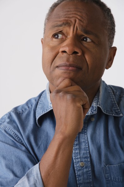 Portrait of mature man, studio shot. Photo : Rob Lewine