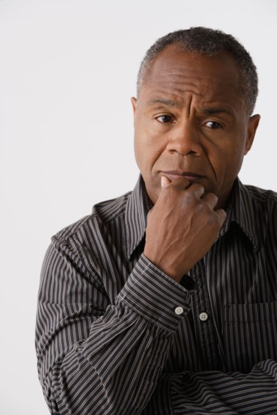 Portrait of mature man, studio shot. Photo: Rob Lewine
