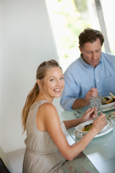 Mature couple eating meal. Photo: Rob Lewine