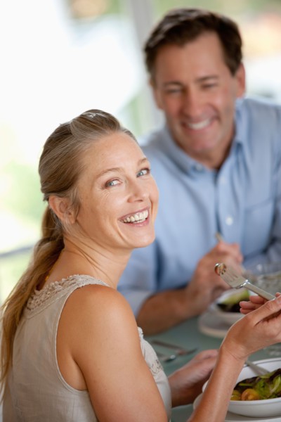 Mature couple eating meal. Photo: Rob Lewine