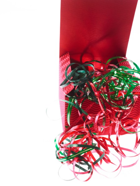 Studio shot of Red Box and Red and Green Ribbon on white background. Photo : David Arky