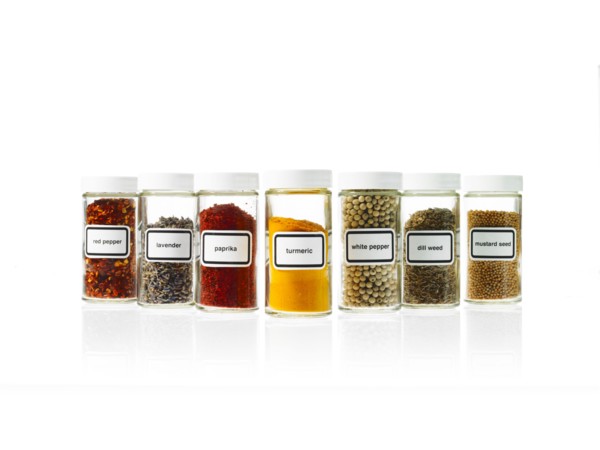 Studio shot of Jars with spices on white background. Photo : David Arky