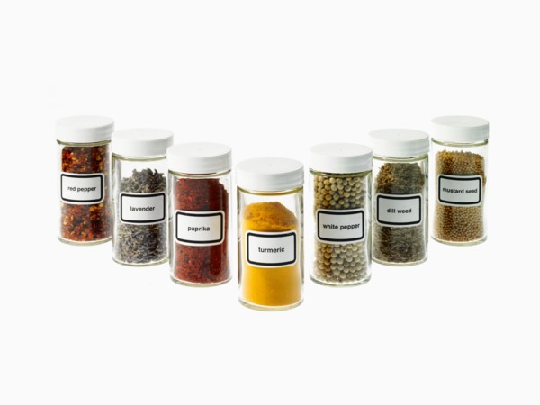 Studio shot of Jars with spices on white background. Photo : David Arky