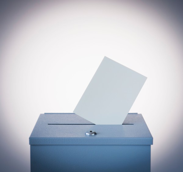 Ballot box and blank paper, studio shot. Photo: Daniel Grill