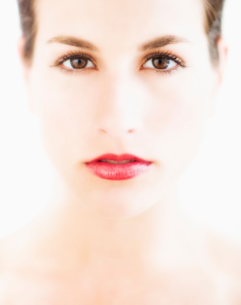 Studio portrait of young woman.