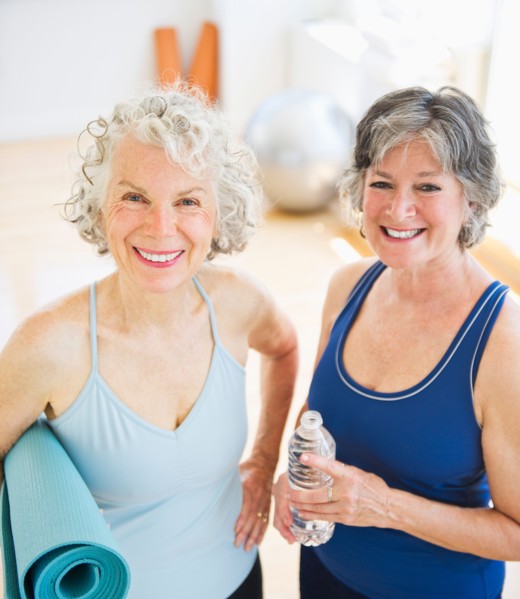 Two senior women exercising. Photo : Daniel Grill