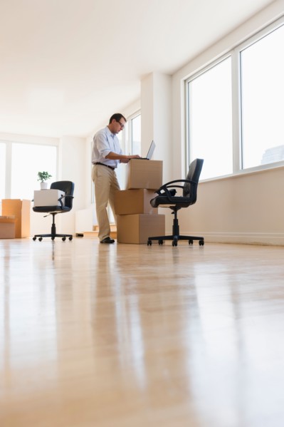 Businessman setting up office.