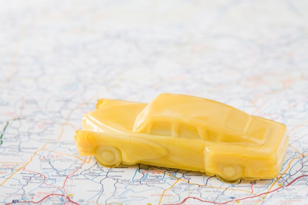 Studio shot of old-fashioned toy car. Photo : Kristin Lee