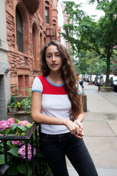 USA, New York, New York City, Portrait of young woman standing on street. Photo : Winslow