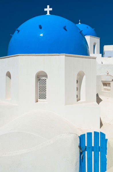 Greece, Cyclades Islands, Santorini, Oia, Church dome with cross.