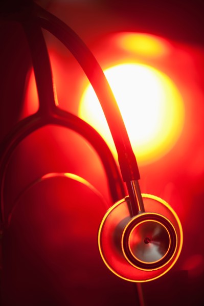 Stethoscope in spotlight.