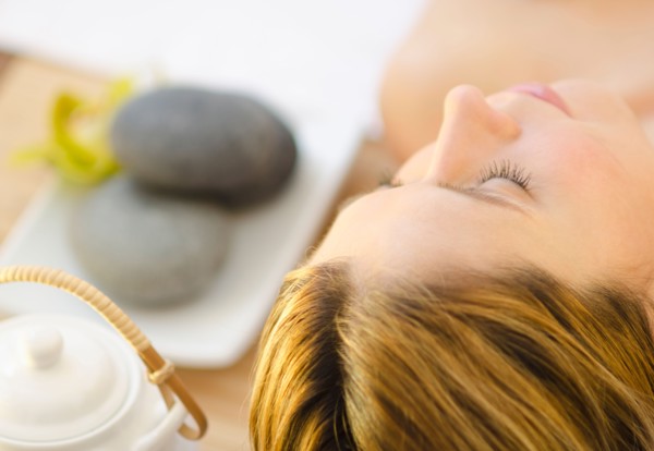 Woman relaxing at health spa.