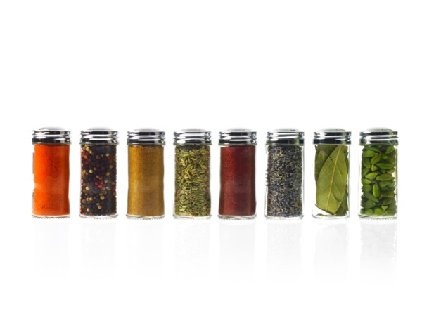 Studio shot of row of jars with spices. Photo: David Arky