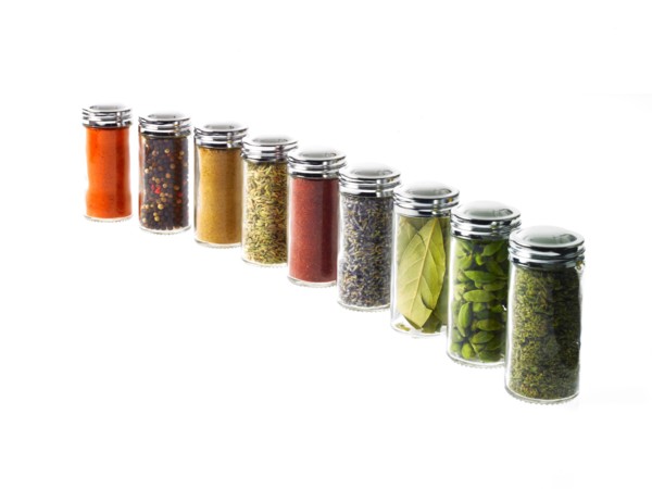 Studio shot of row of jars with spices. Photo: David Arky