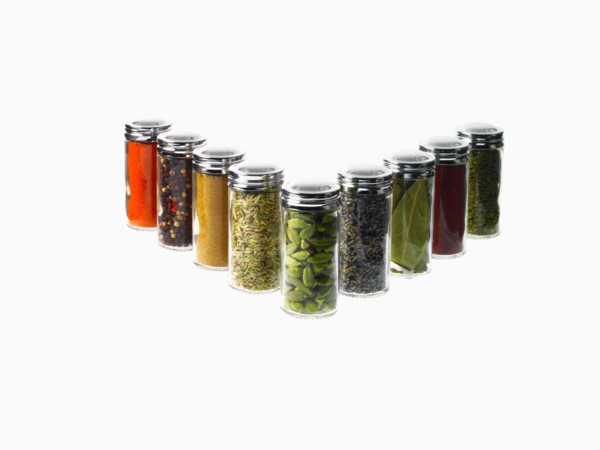 Studio shot of row of jars with spices. Photo: David Arky