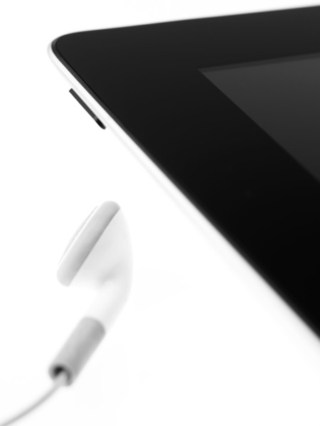 Studio shot of mp3 player and earphone. Photo : David Arky