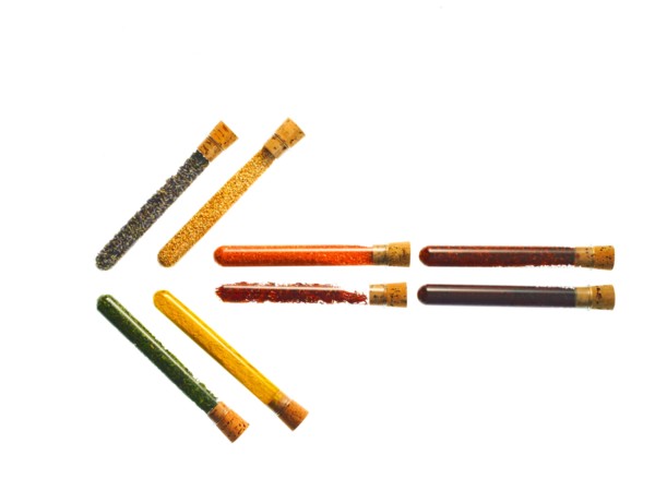 Studio shot of Test Tubes making Arrow shape on white background. Photo : David Arky