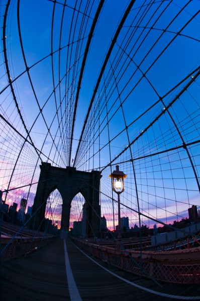 USA, New York State, New York City, Manhattan, Brooklyn Bridge at dusk. Photo: Daniel Grill