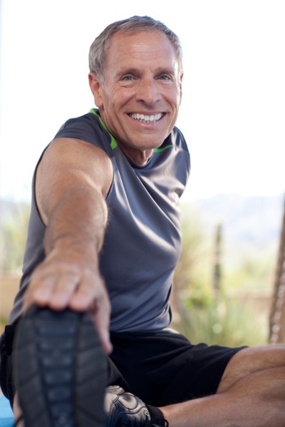 Portrait of senior stretching. Photo : db2stock