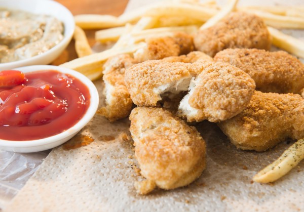 Close up of fried chicken fingers. Photo : Jamie Grill
