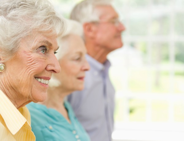 Profiles of senior women and senior man.