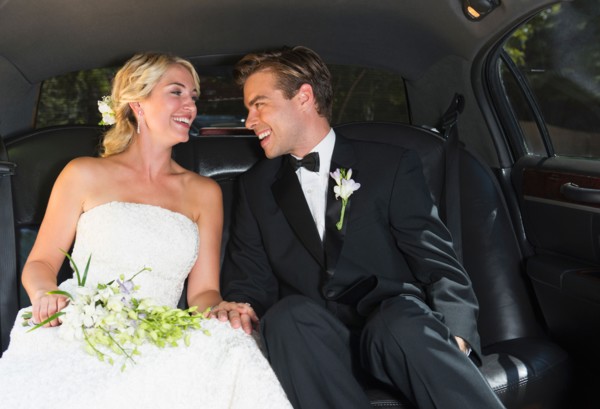 Married couple in limousine.