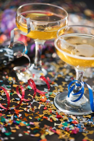 Two glasses of champagne and confetti. Photo: Daniel Grill
