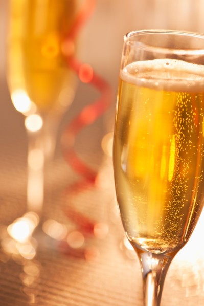 Flutes with champagne, close-up. Photo: Daniel Grill
